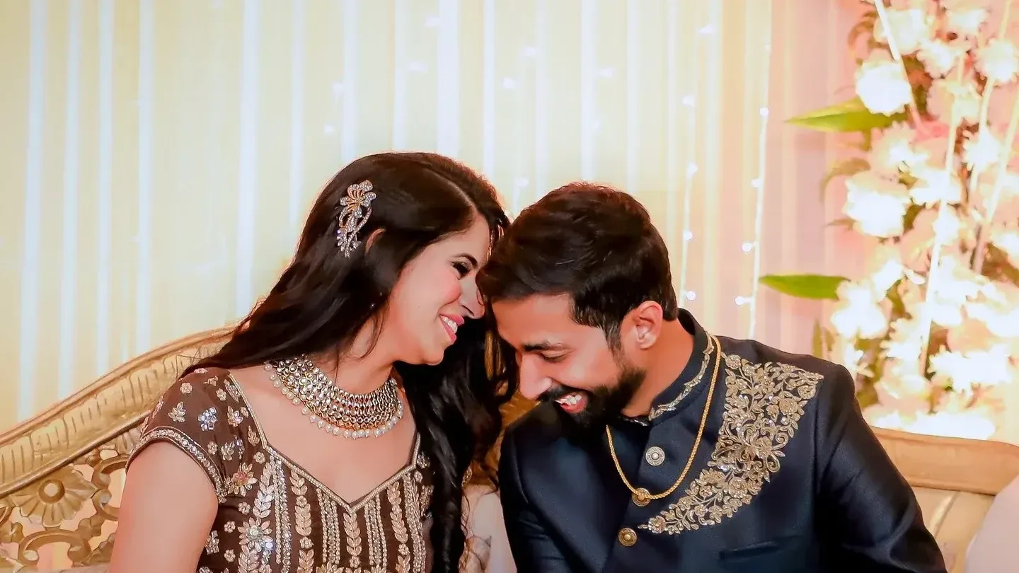 Candid wedding photographer Ghaziabad - couple sharing a laugh
